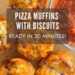 Pizza muffins made with biscuits on a wooden cutting board board with side of marinara sauce.